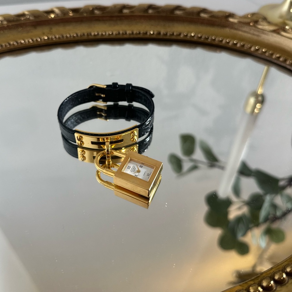 Gold and Black Lock Bracelet Watch